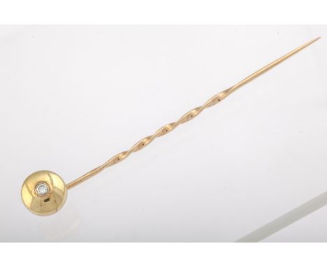 A 9ct gold and diamond single stone stick pin, hallmarks for London 1983. 2.1g gross