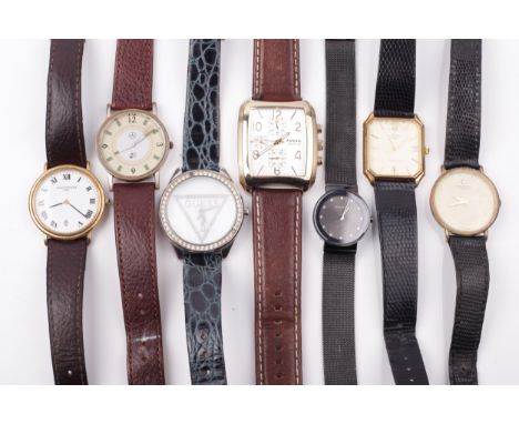 Seven various 'designer' wrist quartz watches including a gold-plated Fossil 'Speedway'. The tonneau shaped watch with a silv