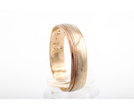 A vintage 9ct bi-colour gold broad wedding band, hallmarks for London 1984, 5.75mm wide, size leading edge  Z, 3g 