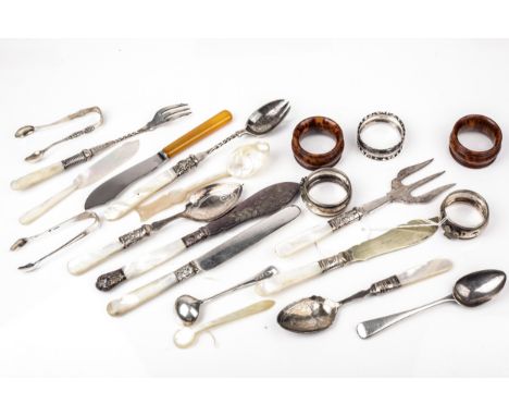 A small collection of silver and various plated and mother of pearl handled items. The silver to include three napkin rings, 