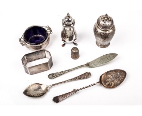 A small collection of silver. Including a round salt with two 'hearts' and scroll flat handles (blue glass liner), mark of Ja