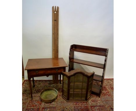 A Mahogany Side Table, with a frieze drawer raised upon turned tapering legs with pad feet, together with a four shelf bookca