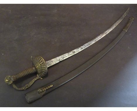 A 19th Century Continental Boys Sword, plain 18½" curved blade, the gilt hilt with a single shell guard, complete in leather 