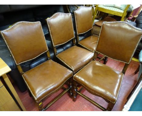 Well presented set of four oak and brass button edged upholstery dining chairs