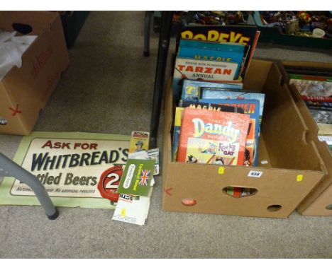 Collection of children's annuals, small quantity of Action Man accessories and a printed paper advert for 'Whitbred Bottled B