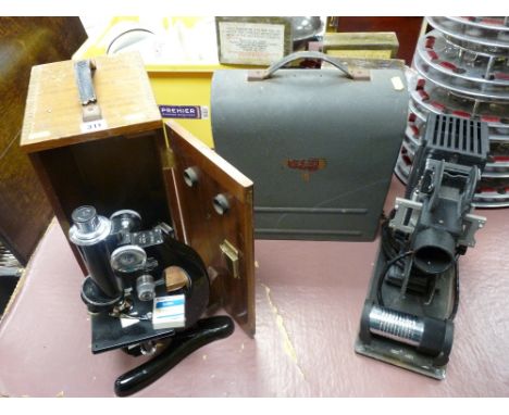 Beck of London vintage laboratory microscope in a wooden case and a cased vintage AMP projector