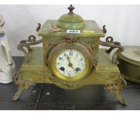 French onyx and gilt metal mantel clock