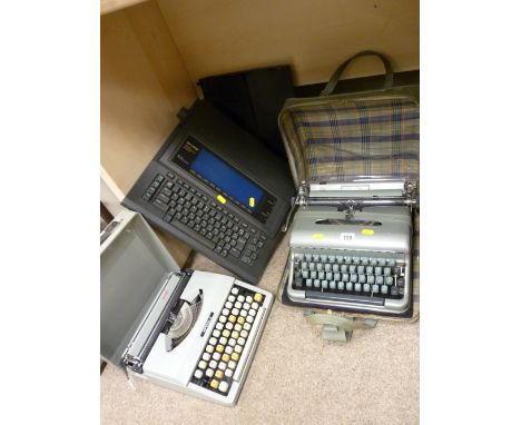 Vintage cased typewriters - Imperial Signet, Bluebird of West Germany and a word processor