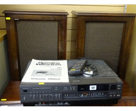 Vintage Panasonic video recorder and a pair of wooden cased speakers E/T