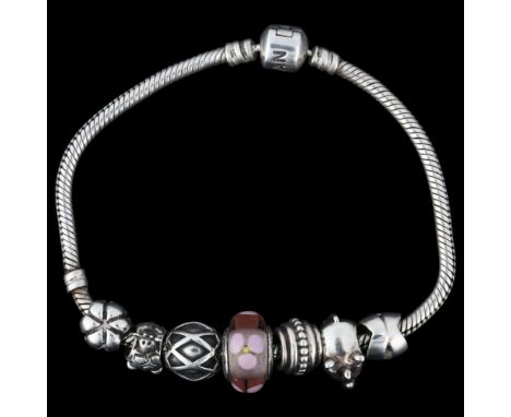 PANDORA - a sterling silver snake link charm bracelet, with 7 silver charms, 20cm, 36.1gNo damage or repair, only light surfa