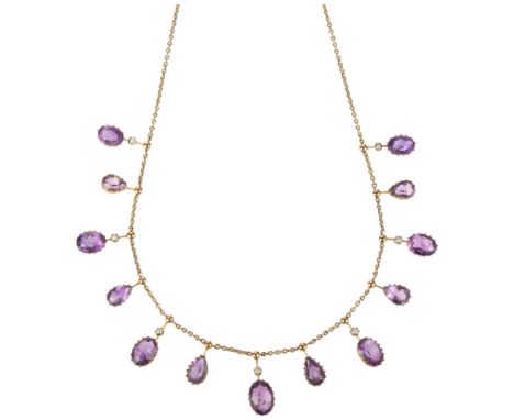 An Edwardian amethyst and split pearl fringe necklace, circa 1910, each offset drop claw set with oval and pear-cut amethysts