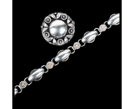 An Art Nouveau style Danish sterling silver flowerhead brooch and similar bracelet, makers include Niels Erik From and Herman