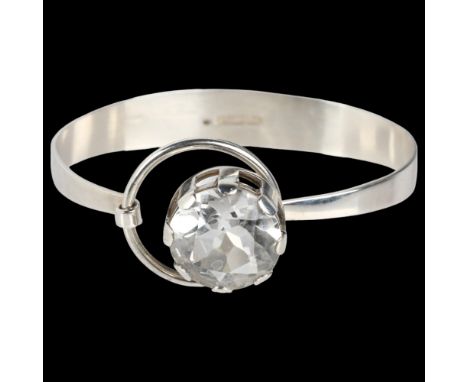 P H KJAER-HANSEN - a Danish modernist silver and rock crystal geometric openwork torque bangle, setting diameter 25.8mm, inte