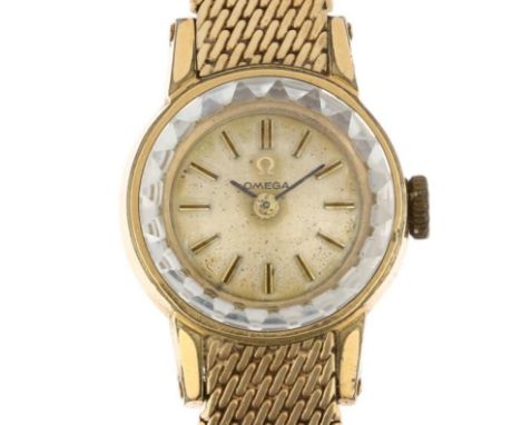 OMEGA - a lady's gold plated mechanical bracelet watch, ref. 511.166, circa 1965, silvered dial with applied gilt baton hour 