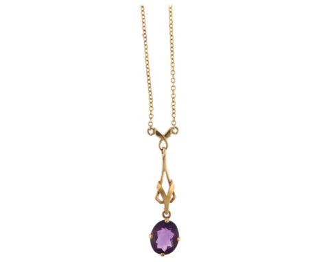 An Edwardian 9ct gold amethyst openwork pendant necklace, set with oval mixed-cut amethyst on 9ct integral belcher link chain