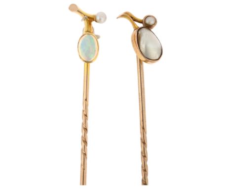 2 early 20th century berry stickpins, comprising opal and blister pearl examples, head 11.3mm, overall 54.9mm, 2g total (2)No