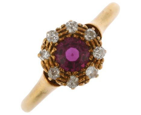 An early 20th century 18ct gold ruby and diamond cluster ring, Birmingham 1910, set with round-cut ruby and single-cut diamon
