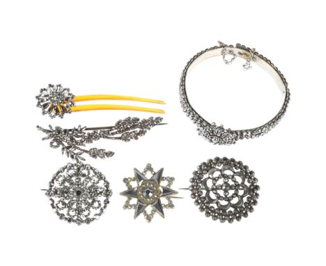 A group of Georgian cut-steel floral jewellery, including bangle, brooches, and hair clipLot sold as seen unless specific ite