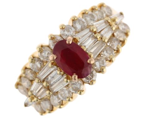 A 14ct gold ruby and diamond cluster band ring, set with oval mixed-cut ruby surrounded by baguette and modern round brillian