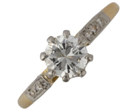 An 18ct gold 0.6ct solitaire diamond ring, platinum-topped, claw set with modern round brilliant-cut diamond and single-cut d