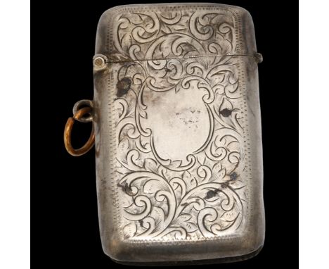 A large Edwardian silver Vesta case, Joseph Gloster Ltd, Birmingham 1902, rectangular form with allover engraved foliate deco