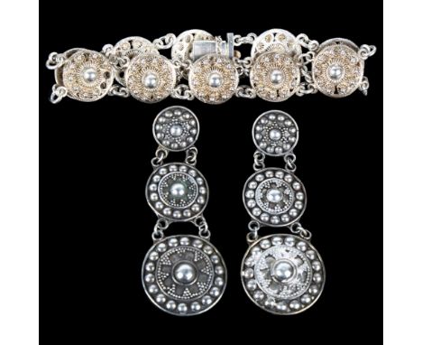 A Scandinavian silver Viking Revival bracelet and earring set, bracelet 17cm, earrings 58mm, 28.7g total (2)No damage or repa