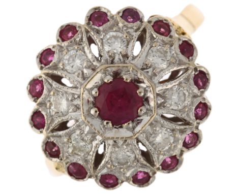 A late 20th century 18ct gold ruby and diamond flowerhead cluster ring, maker CMJ, London 1987, setting height 16mm, size O, 