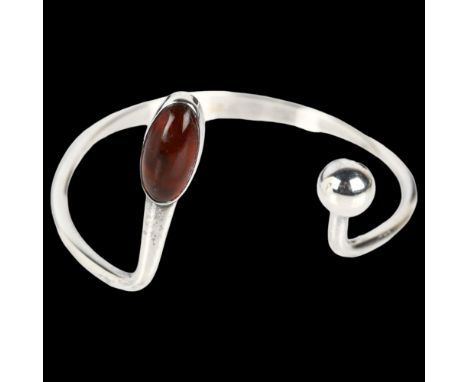 NIELS ERIK FROM - a Danish modernist sterling silver amber torque bangle, setting height 41.7mm, internal circumference appro