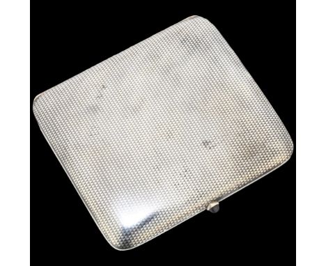 An Art Deco sterling silver and niello curved cigarette case, imported by Paul Ettlinger, London 1913, curved rectangular for