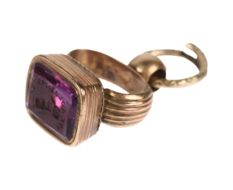 A 19th century amethyst 'For Auld Lang Syne' seal fob, the foil-back amethyst intaglio carved with motto and crest of hand ho