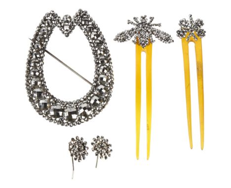 A group of Georgian cut-steel animal jewellery, including bee and butterfly hair clips, large horseshoe brooch, etcLot sold a