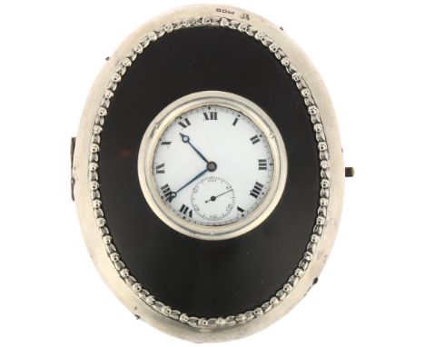 An early 20th century silver and tortoiseshell mounted leather travelling pocket watch case, with strut backing and gun metal