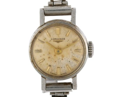 LONGINES - a lady's stainless steel mechanical bracelet watch, circa 1960s, silvered dial with applied gilt baton hour marker