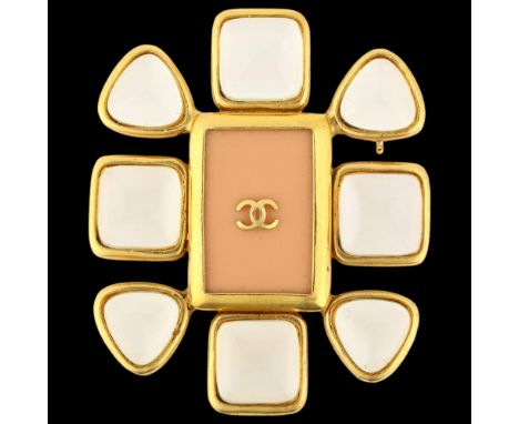 CHANEL - a Vintage peach enamel Gripoix brooch, circa 1996, pink enamel centre with CC logo surrounded by clear Gripoix stone