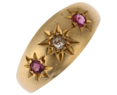 An early 20th century 18ct gold three stone ruby and diamond gypsy ring, maker WL, Birmingham 1905, setting height 7.7mm, siz