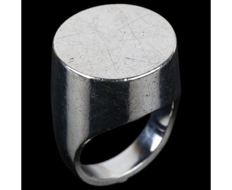 A large Continental modernist silver dress ring, plain circular form, apparently unmarked, setting height 21.9mm, size T, 17.