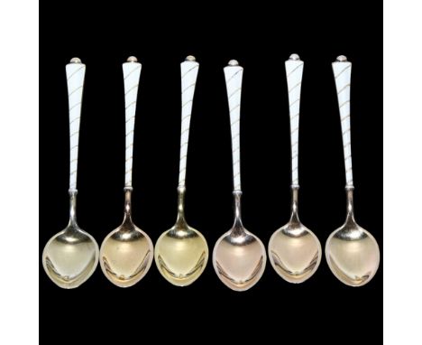 EGON LAURIDSEN - a set of Danish vermeil sterling silver and white enamel coffee spoons, 9.5cmNo damage or repair, no enamel 