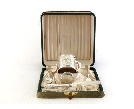 An American silver five-piece christening set by Black, Starr and Frost of New York, circa 1910/20, the mug acid-etched with 