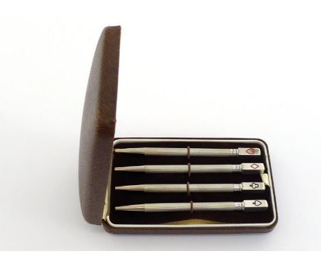 A set of four American silver propelling Bridge pencils stamped "Sterling Silver", engine-turned, the rectangular terminals e