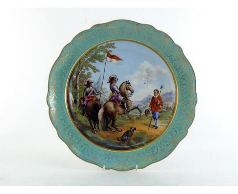 A ceramic display plate showing two cavalrymen in 17th century costume approaching an encampment, a town in the distance, the
