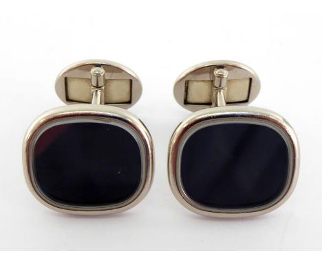 PATEK PHILIPPE, Ellipse, a pair of 18 carat white gold cufflinks, 15mm wide, 17.6gms gross CONDITION: good