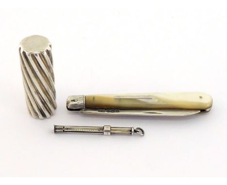A Victorian silver spirally-fluted cylindrical scent bottle by Sampson Mordan, London, 1886, complete with interior glass sto