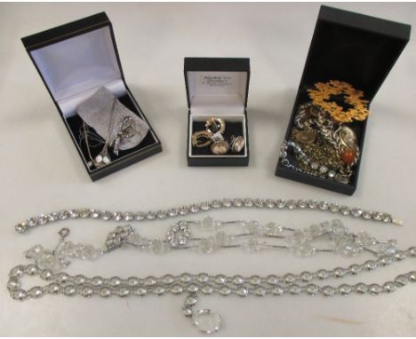 A quantity of dress and costume jewellery to include a 19th century silver and paste set bow brooch and a pearl set stick pin