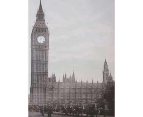 A photographic print of 'Big Ben' fitted verso with a small timepiece in a gilt frame 