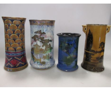 A pair of Doulton and Slater spill vases, another, one by Pinder and Bourne, and another attributed to McIntyre and the last 