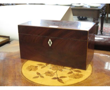A George III mahogany tea caddy 