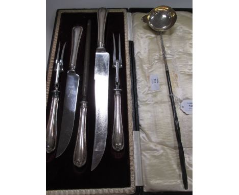 A silver toddy ladle and a cased carving set (2) 