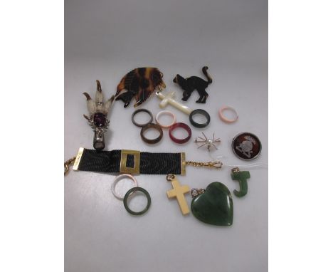 A Victorian 18ct buckle bracelet on black ribbon band, a pearl spider brooch stamped 14k, an amethyst and silver brooch and a