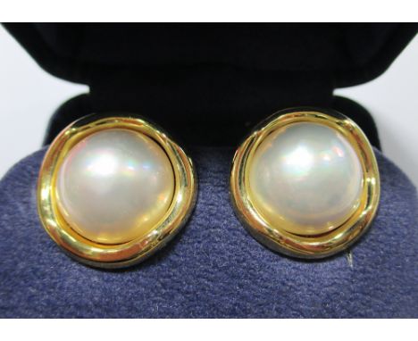 A pair of mabé pearl earrings by Cellino, each 16mm diameter mabé pearl to an undulating border, originally continental post 