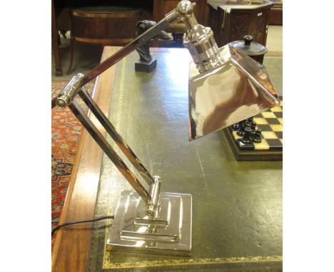 A square base nickel plated desk lamp 